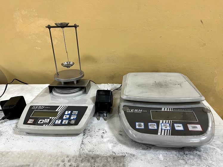 Precision laboratory balances used for weighing composite armor powders